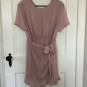 Woman’s pink with polka dots dress